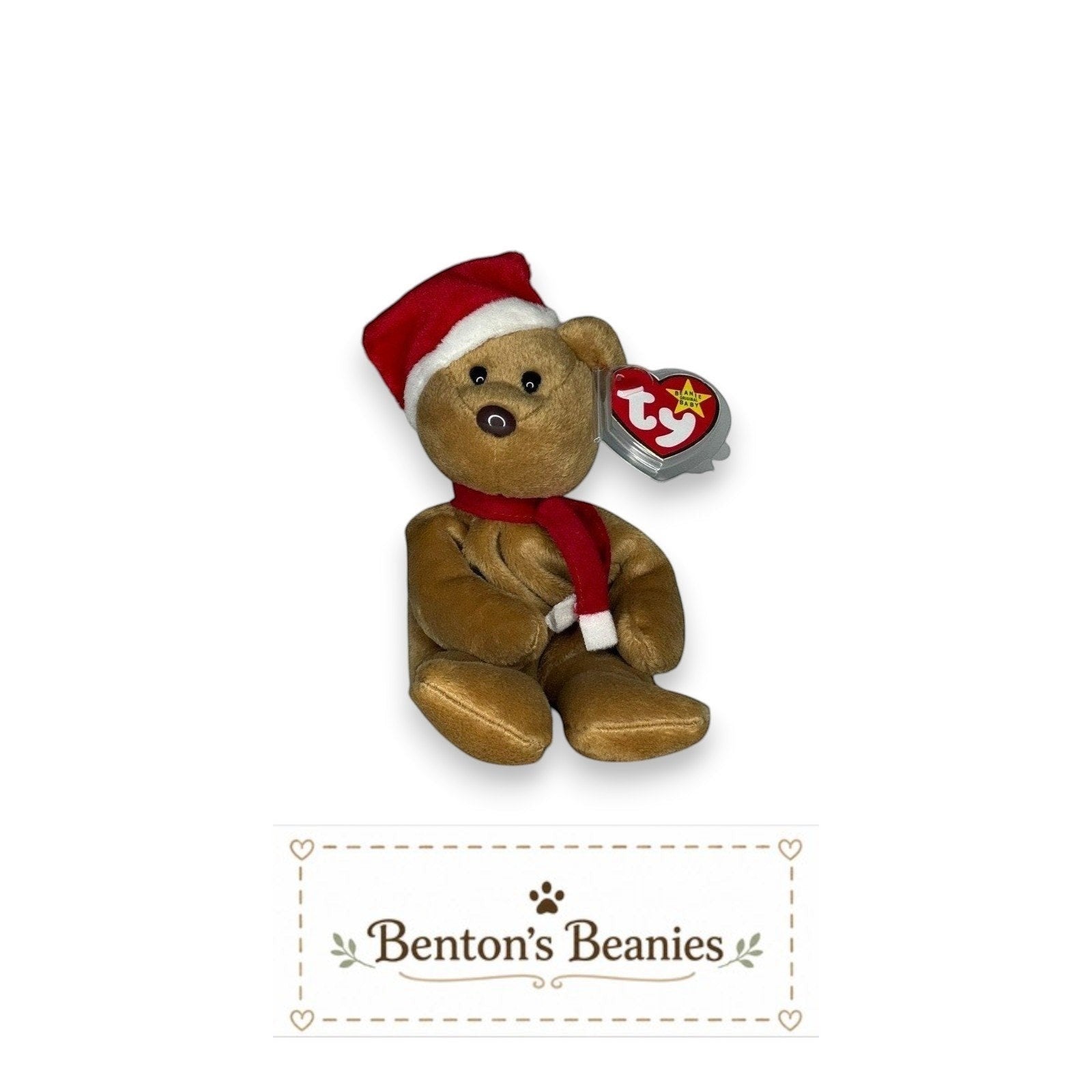 Benton's Beanies 1997 Holiday Teddy Beanie Baby wearing a red Santa hat and scarf with mint heart tag