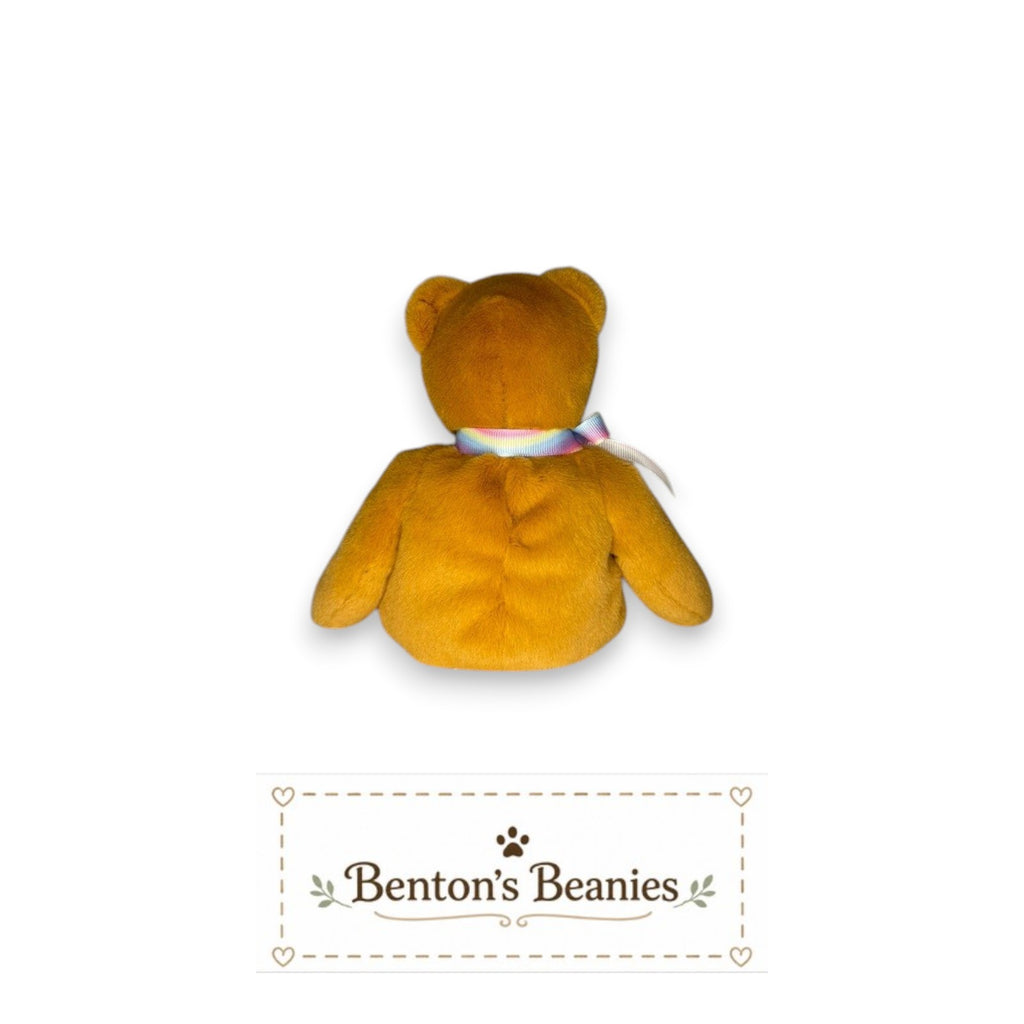 Benton's Beanies Aloha the Bear Ty Beanie Baby, golden plush with pastel rainbow ribbon, Maui Strong emblem.