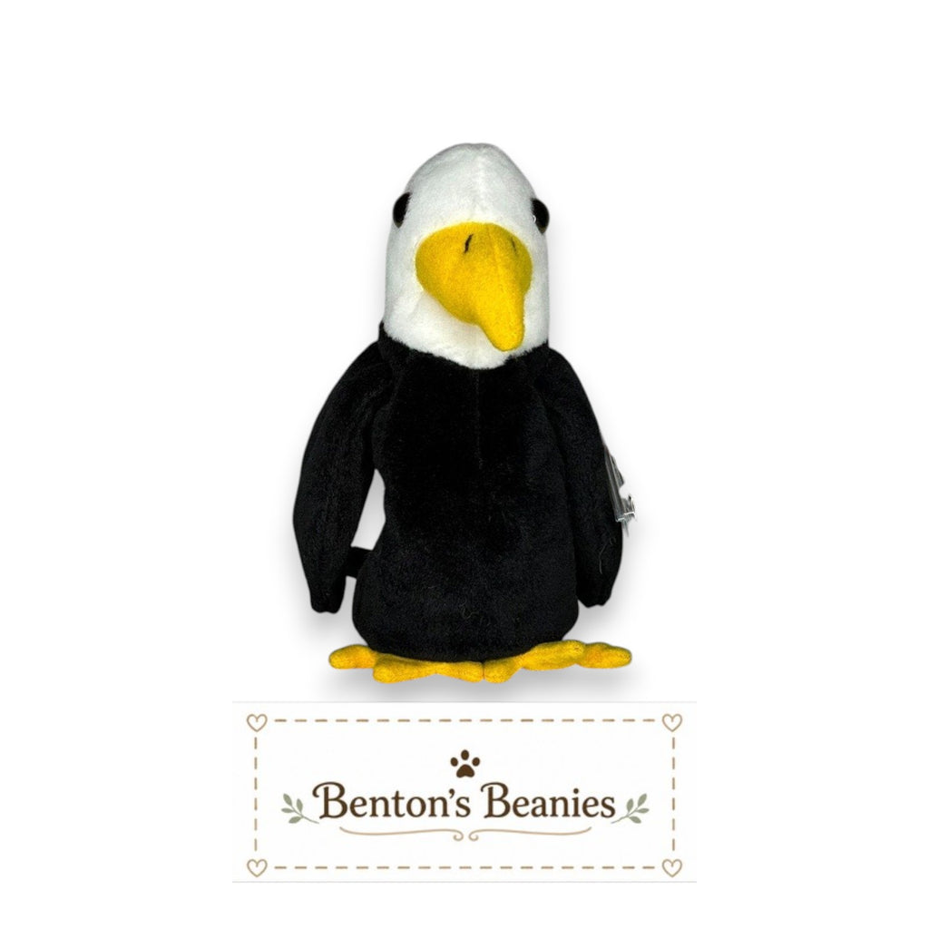 Benton's Beanies Baldy the Eagle plush toy with black body, white head, yellow beak and feet. Classic 90s collectible.