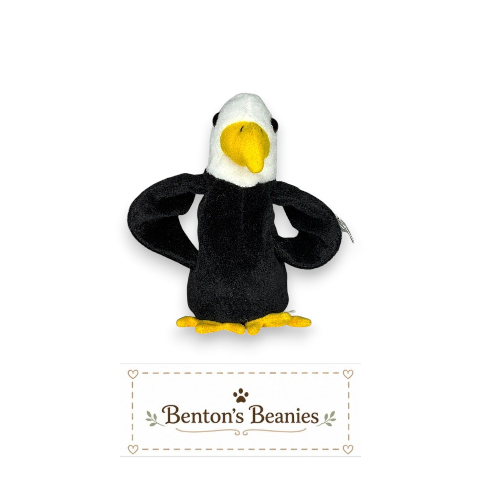 Benton's Beanies Baldy the Eagle plush toy with black body, white head, yellow beak and feet. Classic 90s collectible.