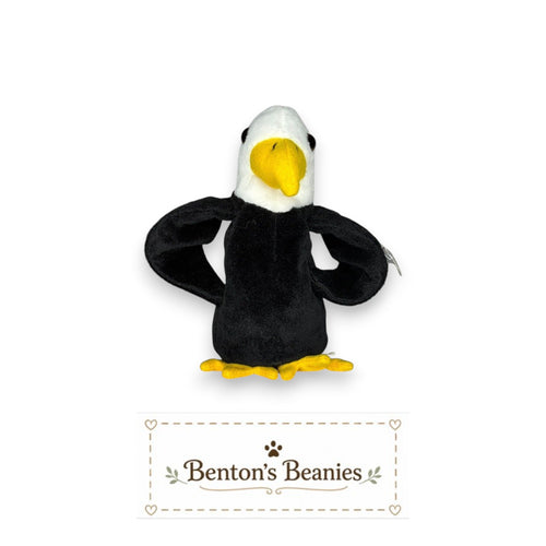 Benton's Beanies Baldy the Eagle plush toy with black body, white head, yellow beak and feet. Classic 90s collectible.