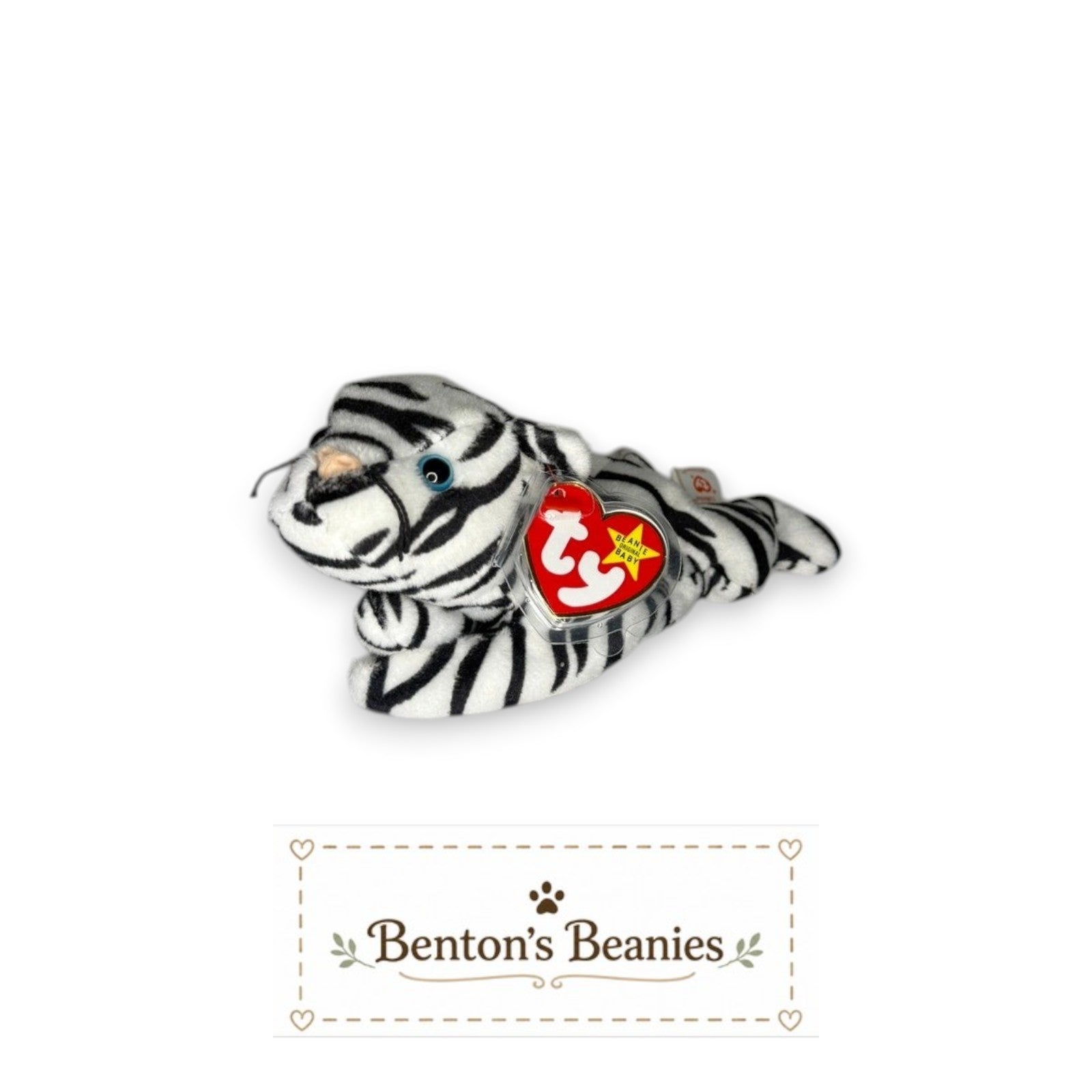 Benton's Beanies Blizzard the Snow Leopard TY Beanie Baby, white plush with black stripes and blue eyes, lying down.