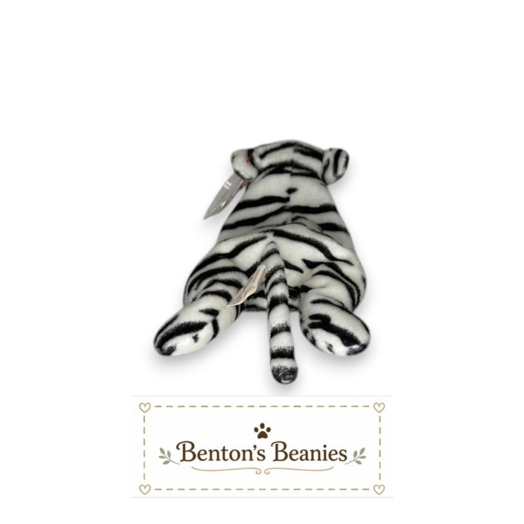 Benton's Beanies Blizzard the Snow Leopard TY Beanie Baby, white plush with black stripes, lounging pose.
