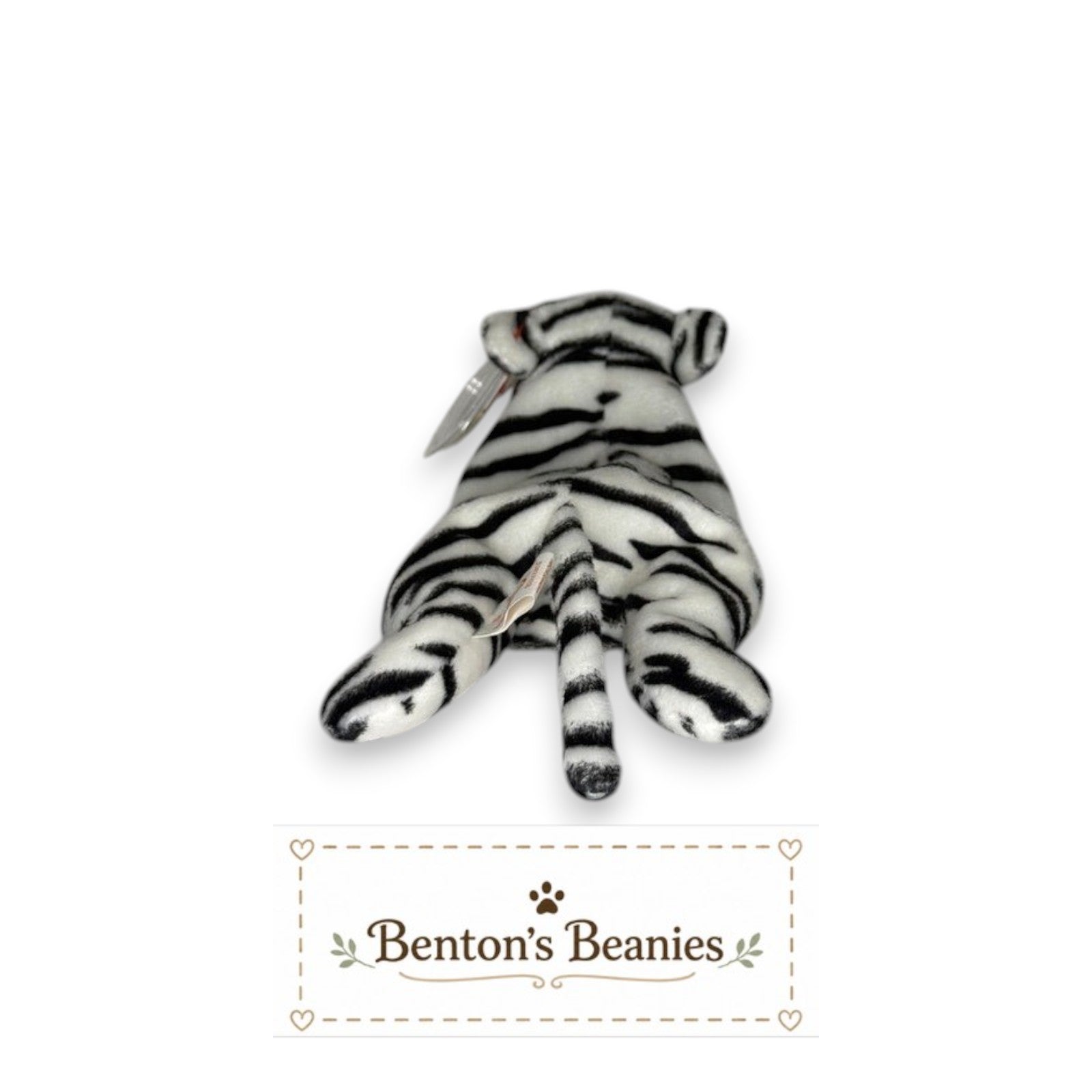 Benton's Beanies Blizzard the Snow Leopard TY Beanie Baby, white plush with black stripes, lounging pose.