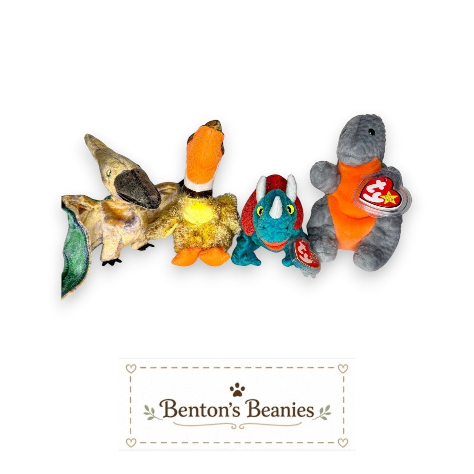 Benton's Beanies collection of four plush dinosaurs: a yellow pterodactyl, a brown duck-billed dinosaur, a blue triceratops, and a gray dinosaur with an orange belly.