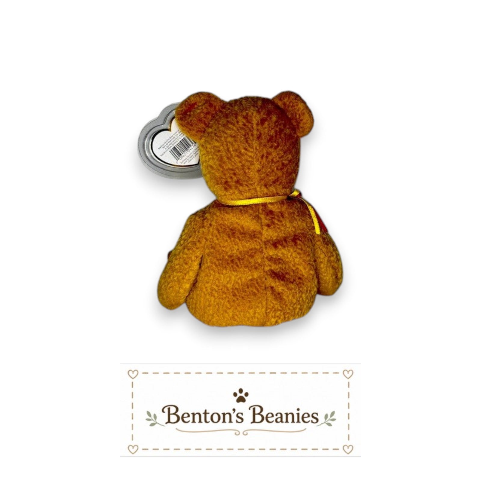 Benton's Beanies Germania the Bear Ty Beanie Baby in golden-brown plush with original tag, viewed from the back.