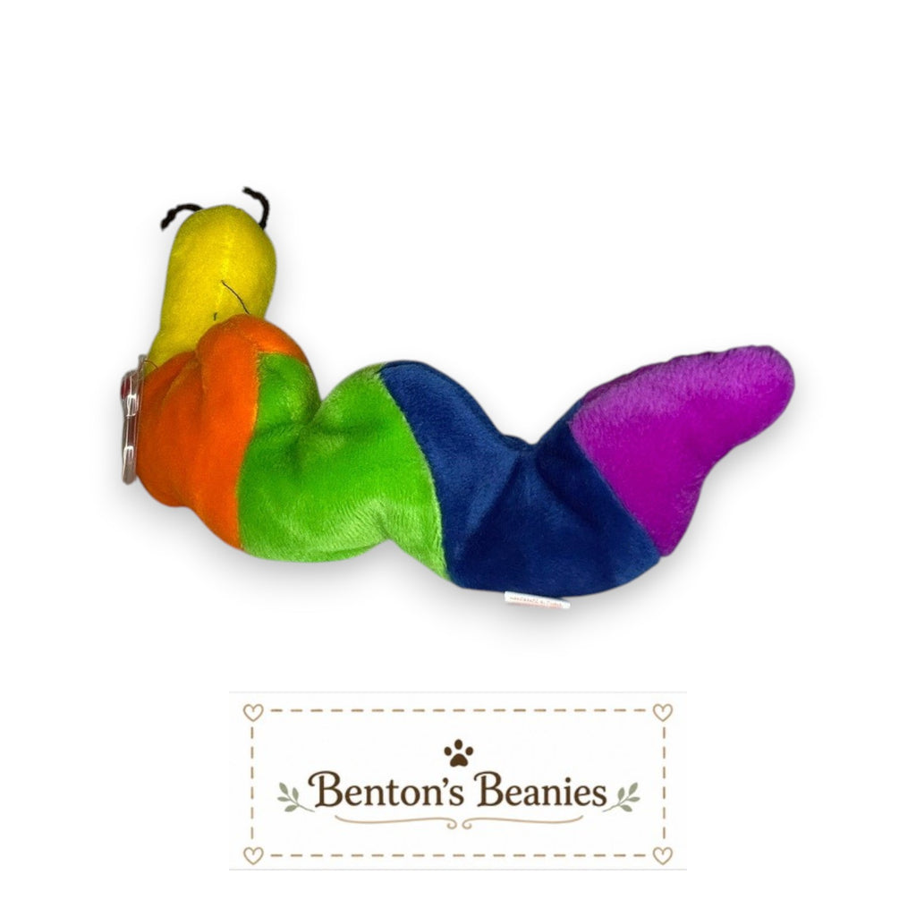 Benton's Beanies Inch the Worm Ty Beanie Baby with vibrant rainbow-striped plush body and original tags attached.