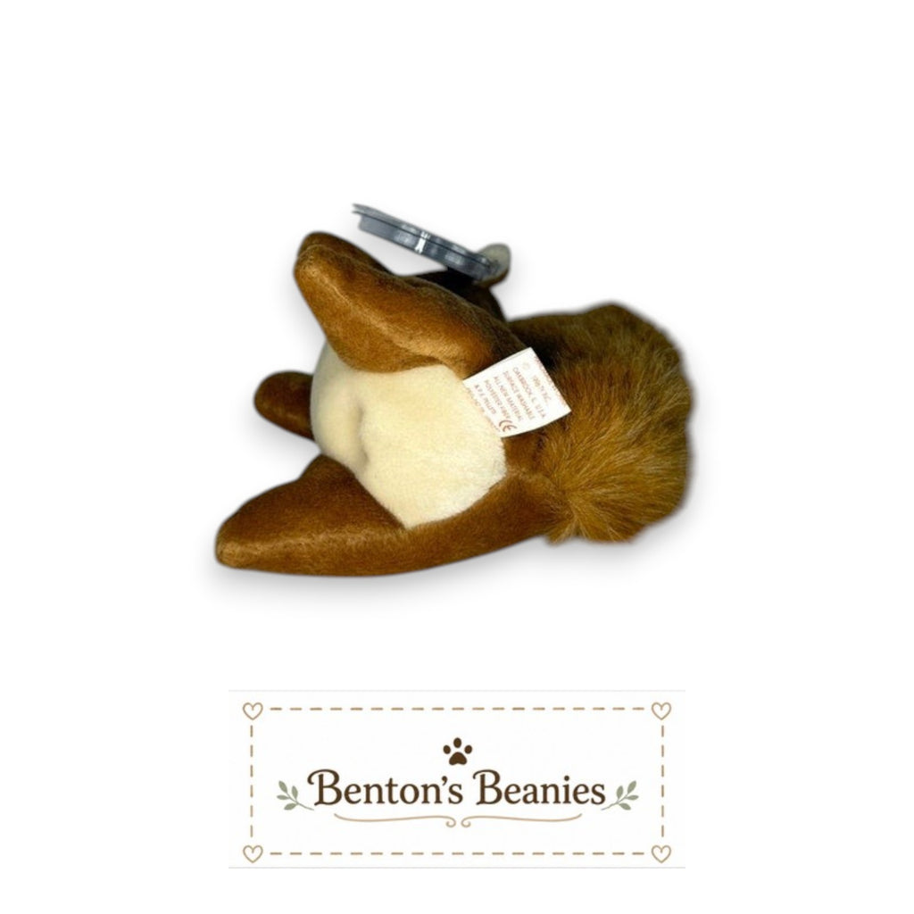 Benton's Beanies Nuts the Squirrel Ty Beanie Baby with brown plush fur, fluffy tail, and original mint condition tags.