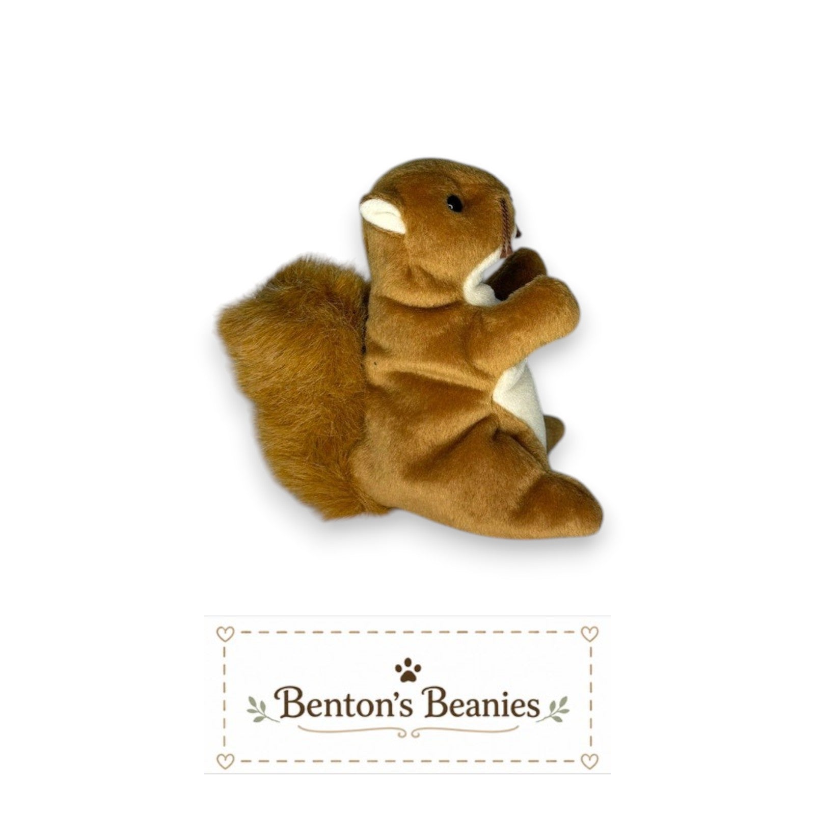 Benton's Beanies Nuts the Squirrel Ty Beanie Baby plush with soft brown fur, fluffy tail, and original tags.