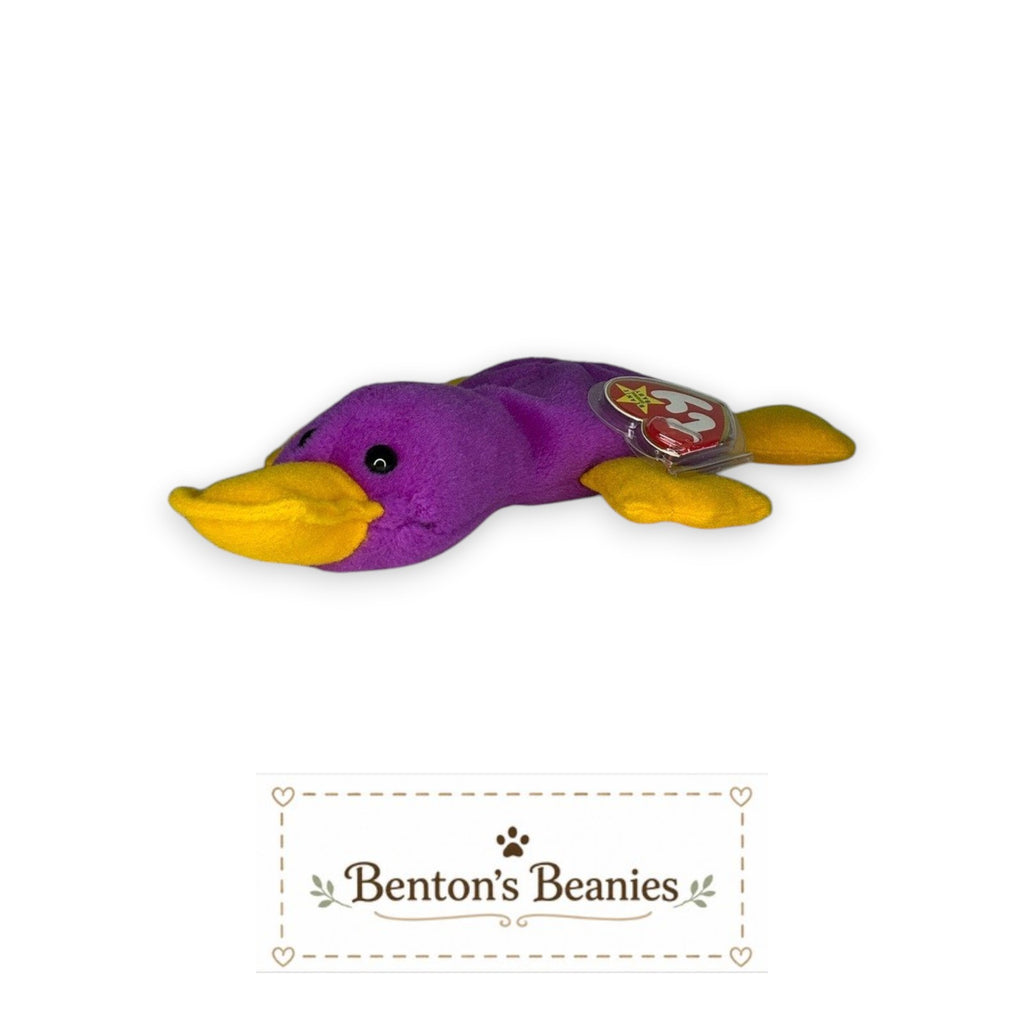 Benton's Beanies purple platypus plush toy with yellow feet and bill, classic 90s Beanie Baby design.