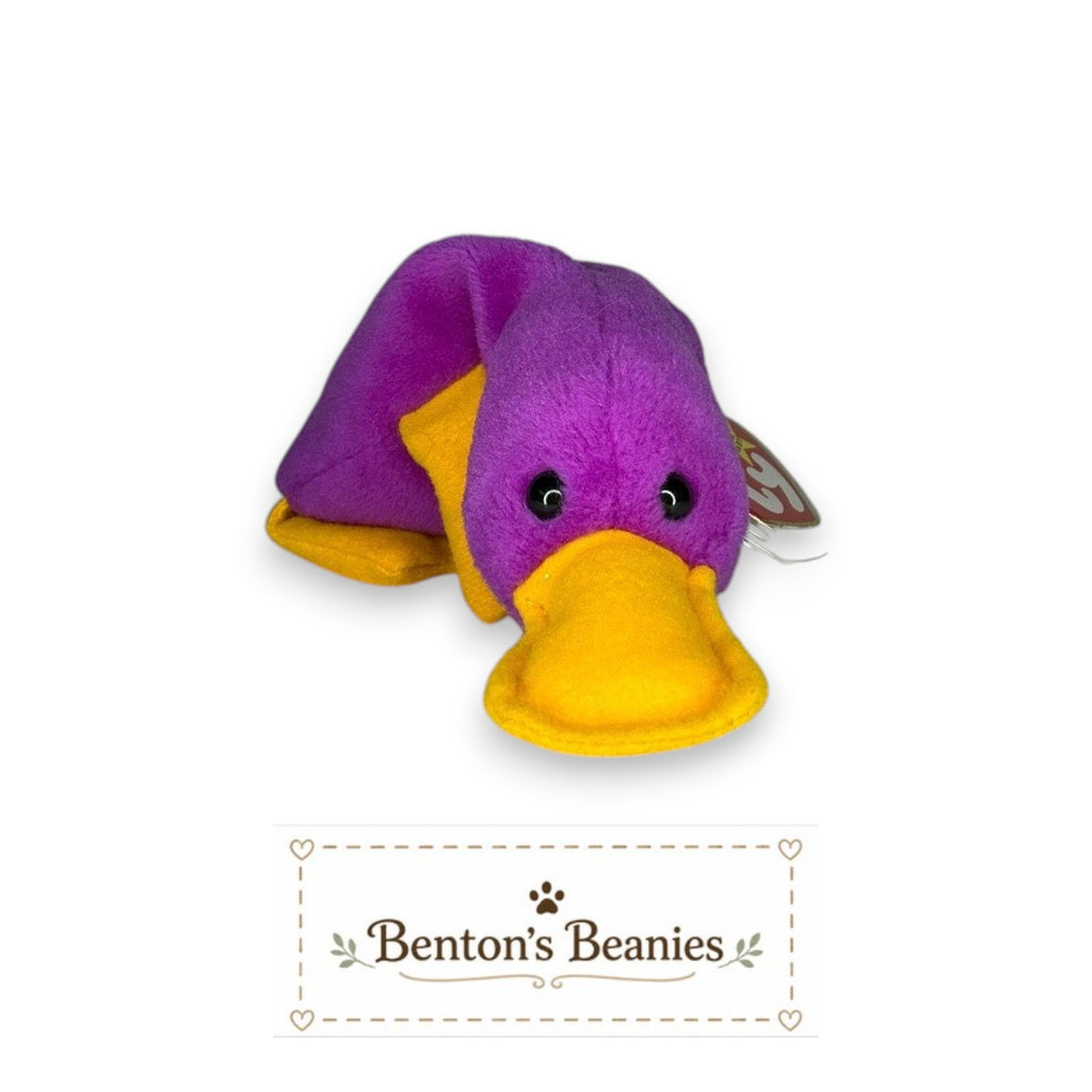 Benton's Beanies purple platypus plush toy with yellow feet and bill, classic 90s collectible.