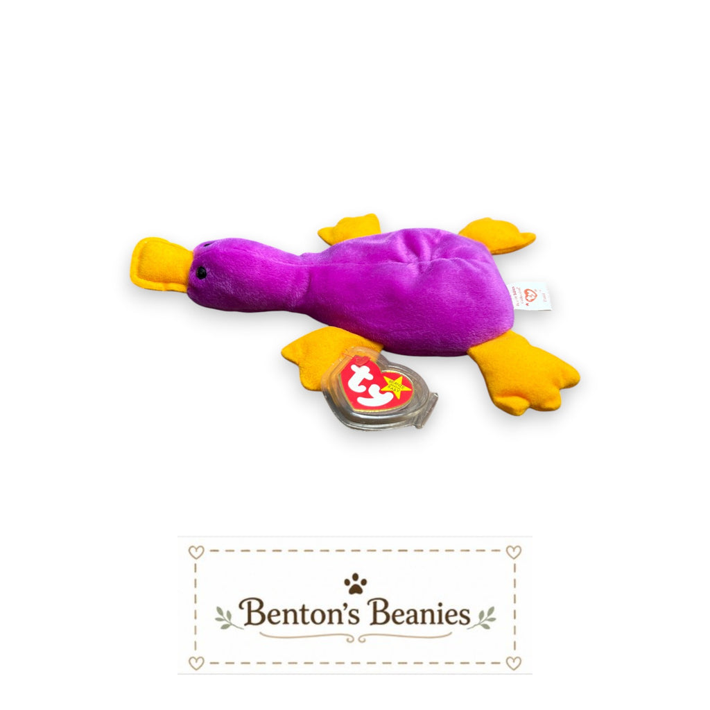 Benton's Beanies purple plush platypus Beanie Baby with yellow feet and bill, mint condition with tags.