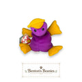 Benton's Beanies purple platypus plush toy with yellow feet, bill, and hat. Features mint heart and tush tags.