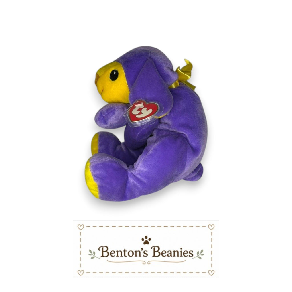 Benton's Beanies Baba the Purple Sheep TY Pillow Pal plush toy with yellow accents and a yellow ribbon.