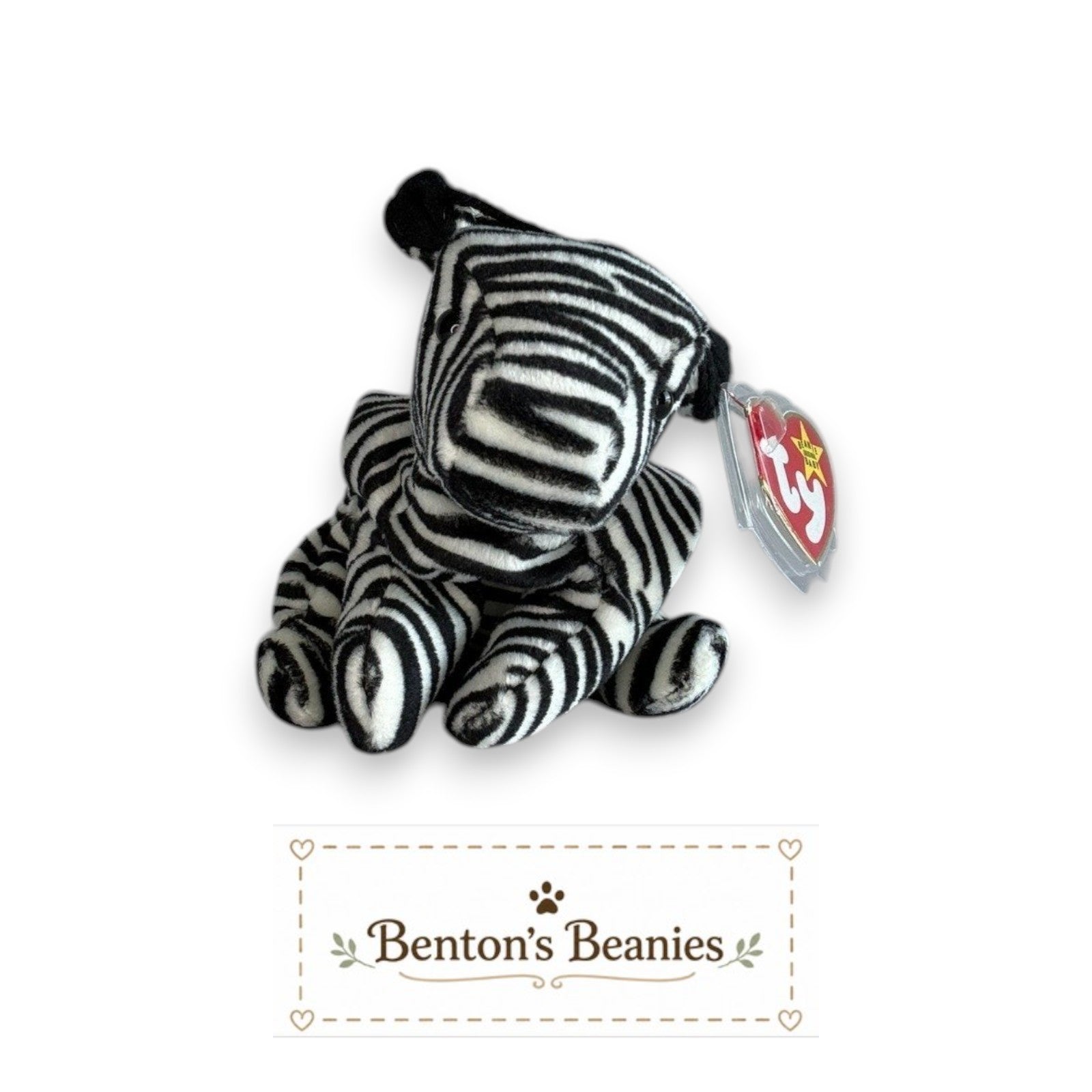 Benton's Beanies Ziggy the Zebra Ty Beanie Baby plush with black and white stripes and original heart tag attached.