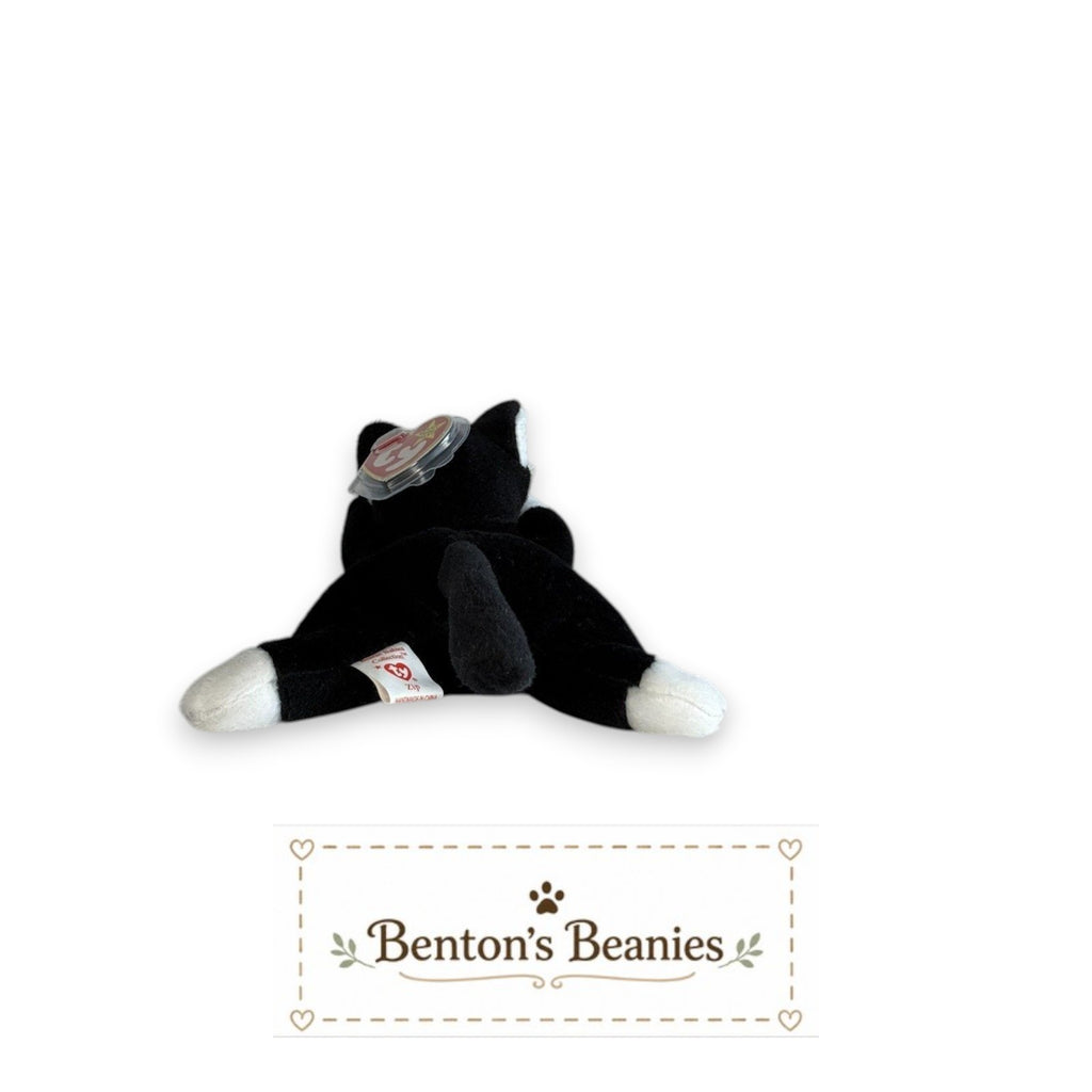 Benton's Beanies Zip the Cat Ty Beanie Baby plush toy from behind showing black fur and white paws with original tags