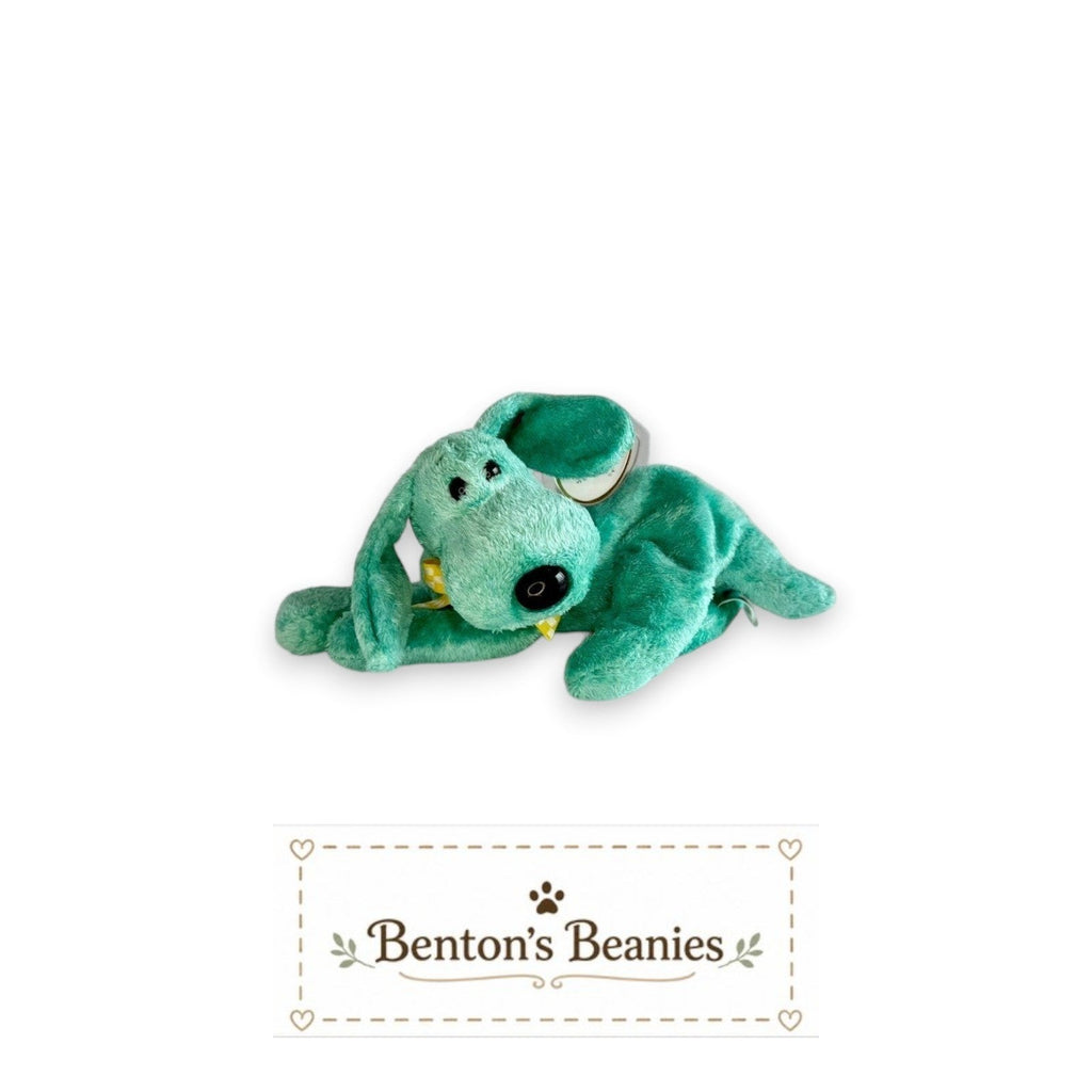 The Beanie Center Diddley the Dog, a turquoise plush toy with floppy ears and a yellow ribbon.