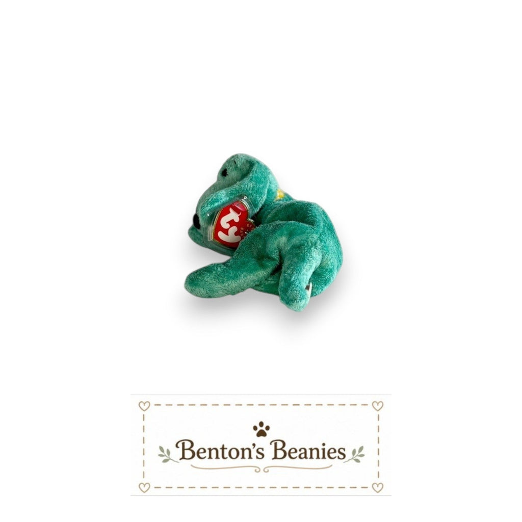 The Beanie Center Diddley the Dog, a turquoise plush toy with floppy ears and a relaxed pose.