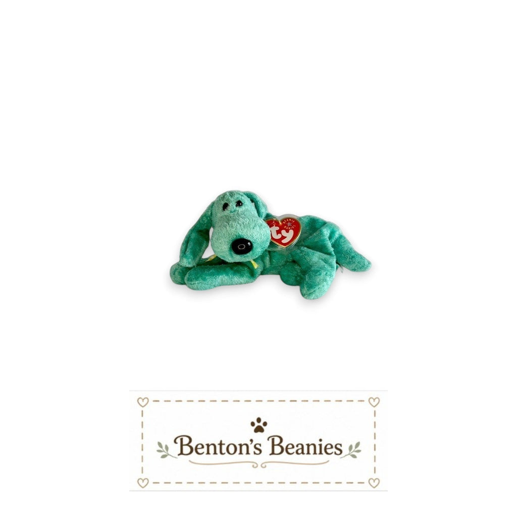 The Beanie Center Diddley the Dog, a turquoise plush toy with floppy ears and a relaxed pose, featuring the iconic Ty heart tag.