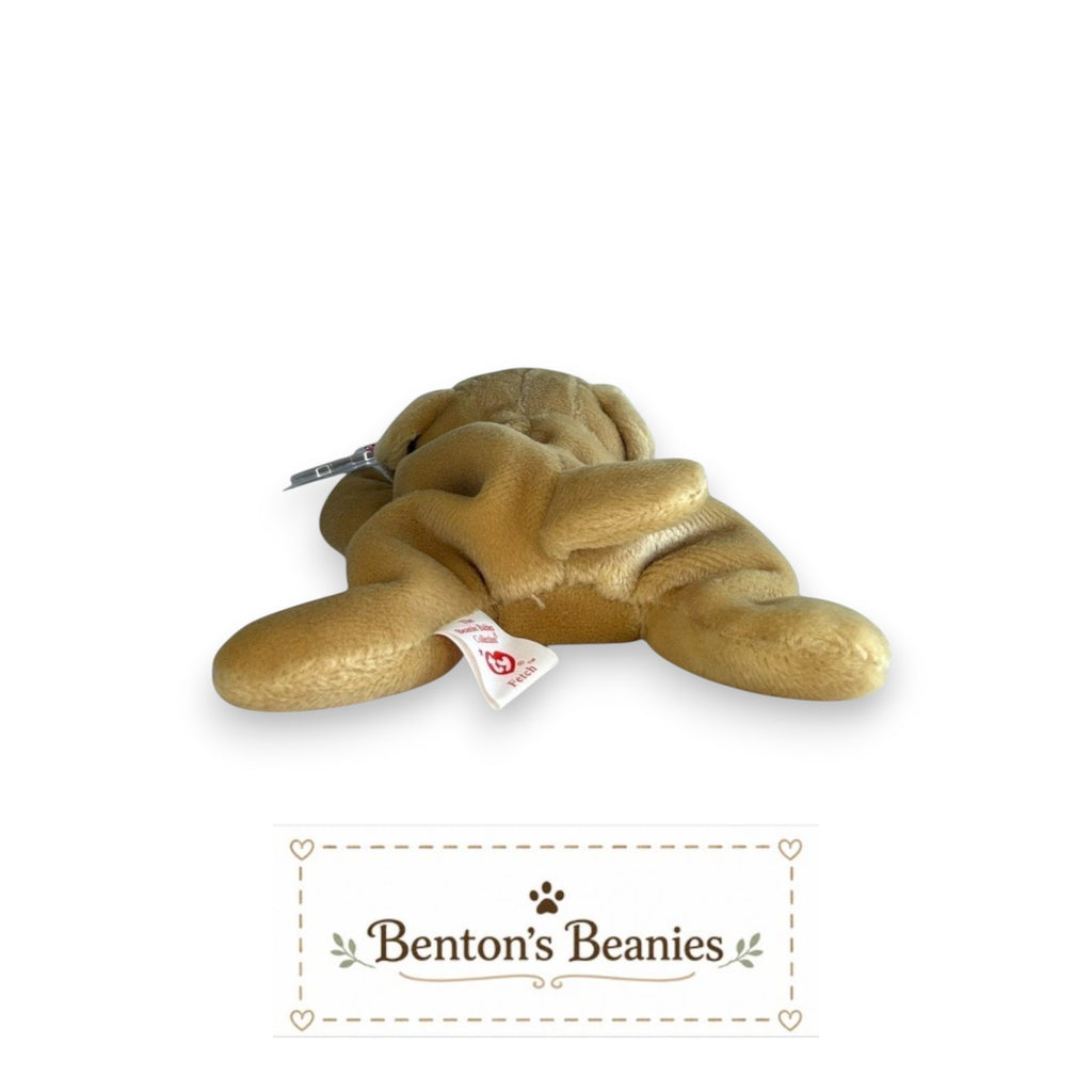 The Beanie Center Fetch the Golden Retriever dog plush toy, tan, with floppy ears and original tags.